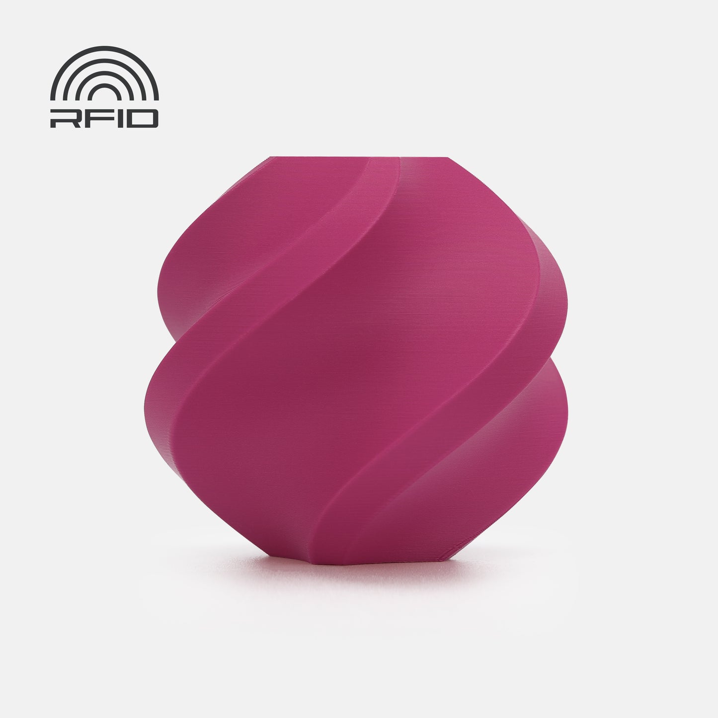 A magenta, spiral-shaped BambuLab Filament Matte by 3D Printing Perth - Cirrus Link with a matte surface and an RFID symbol in the top left corner, set against a white background.