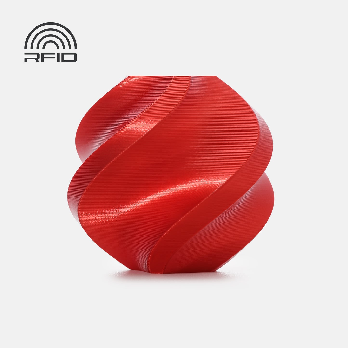 A red, spiral-shaped object 3D printed from BambuLab PLA Silk+ by 3D Printing Perth - Cirrus Link with a glossy finish is shown on a white background. An RFID symbol appears in the upper left corner.