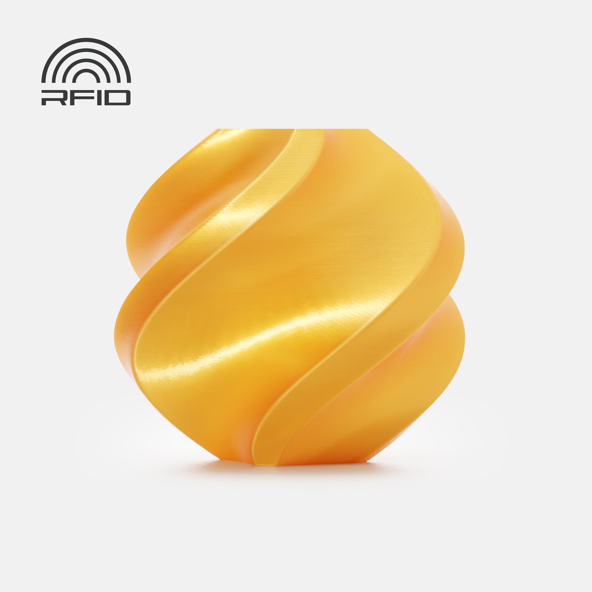 A smooth, golden-yellow, spiral-shaped object sits on a white background with an RFID symbol in the top left—crafted from beginner-friendly, biodegradable BambuLab PLA Silk+ filament by 3D Printing Perth - Cirrus Link.