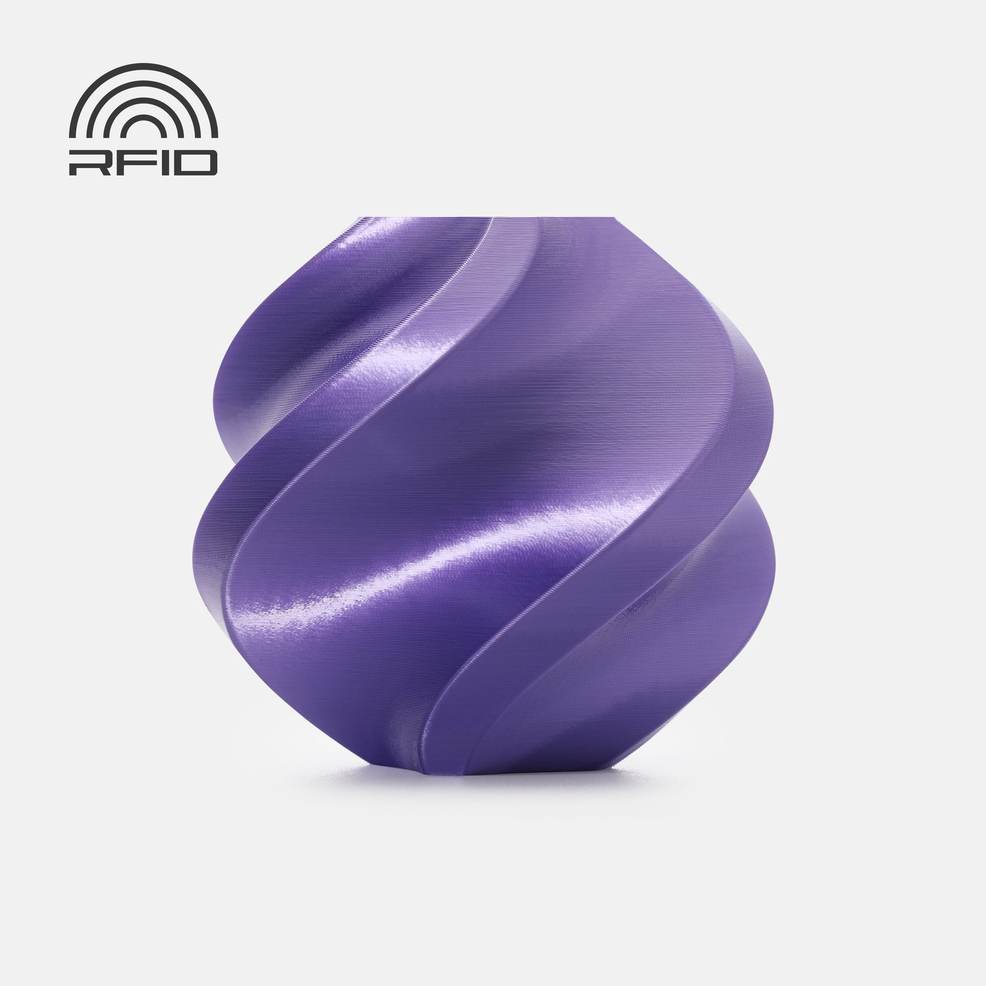 A smooth, glossy, purple spiral object made from BambuLab PLA Silk+ filament by 3D Printing Perth - Cirrus Link with a metallic sheen sits on a white background. An RFID symbol appears in the top left corner.