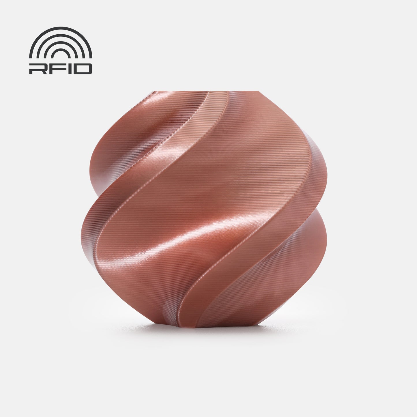 A copper-colored, spiral-shaped object with a smooth finish made from BambuLab PLA Silk+ by 3D Printing Perth - Cirrus Link is displayed on a white background. An RFID symbol appears in the top left corner.
