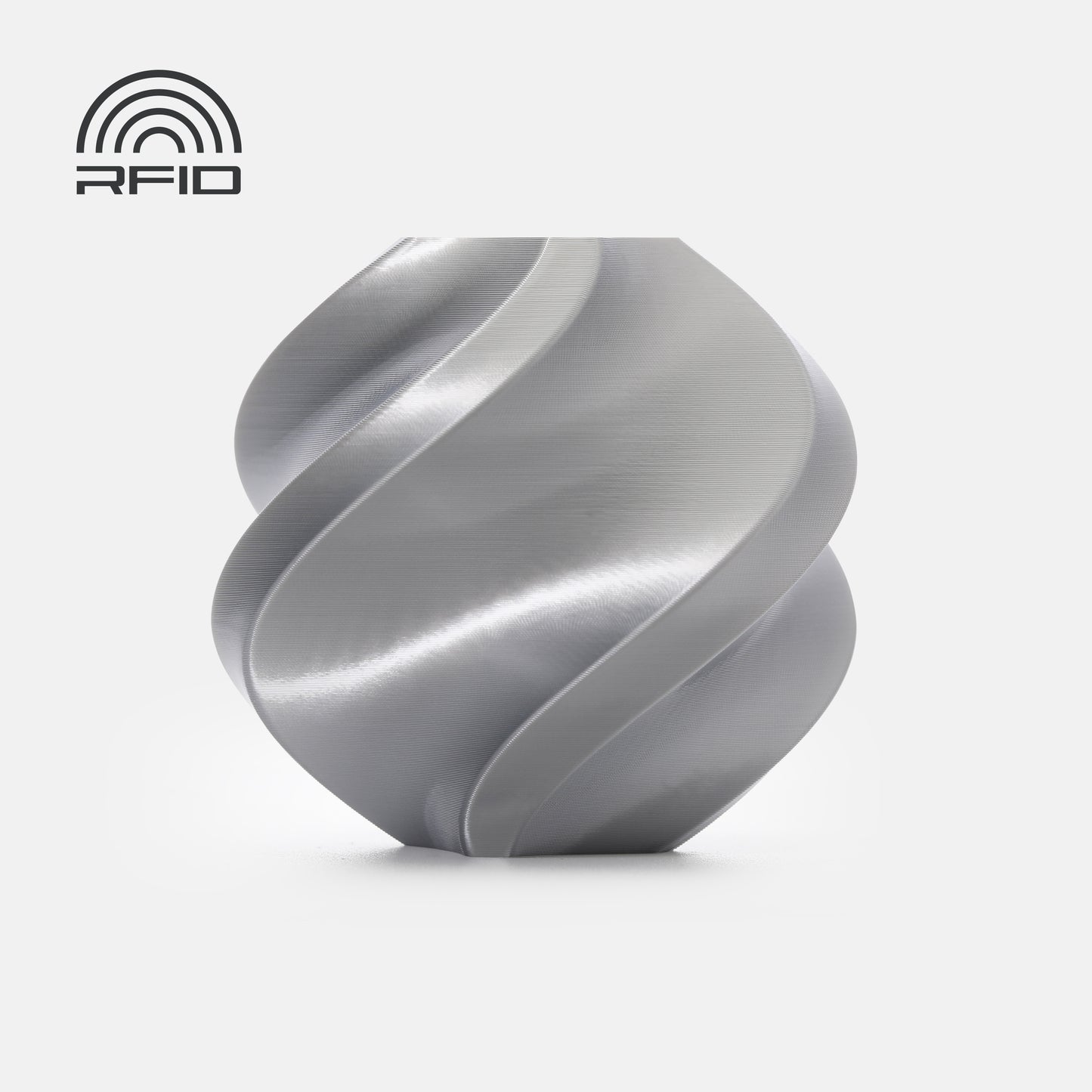 A metallic spiral object made from BambuLab PLA Silk+ by 3D Printing Perth - Cirrus Link rests on a white background, with an RFID symbol in the top left corner.