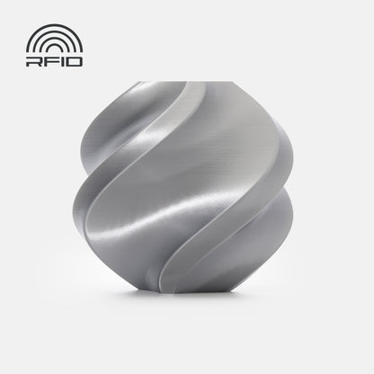 A metallic spiral object made from BambuLab PLA Silk+ by 3D Printing Perth - Cirrus Link rests on a white background, with an RFID symbol in the top left corner.