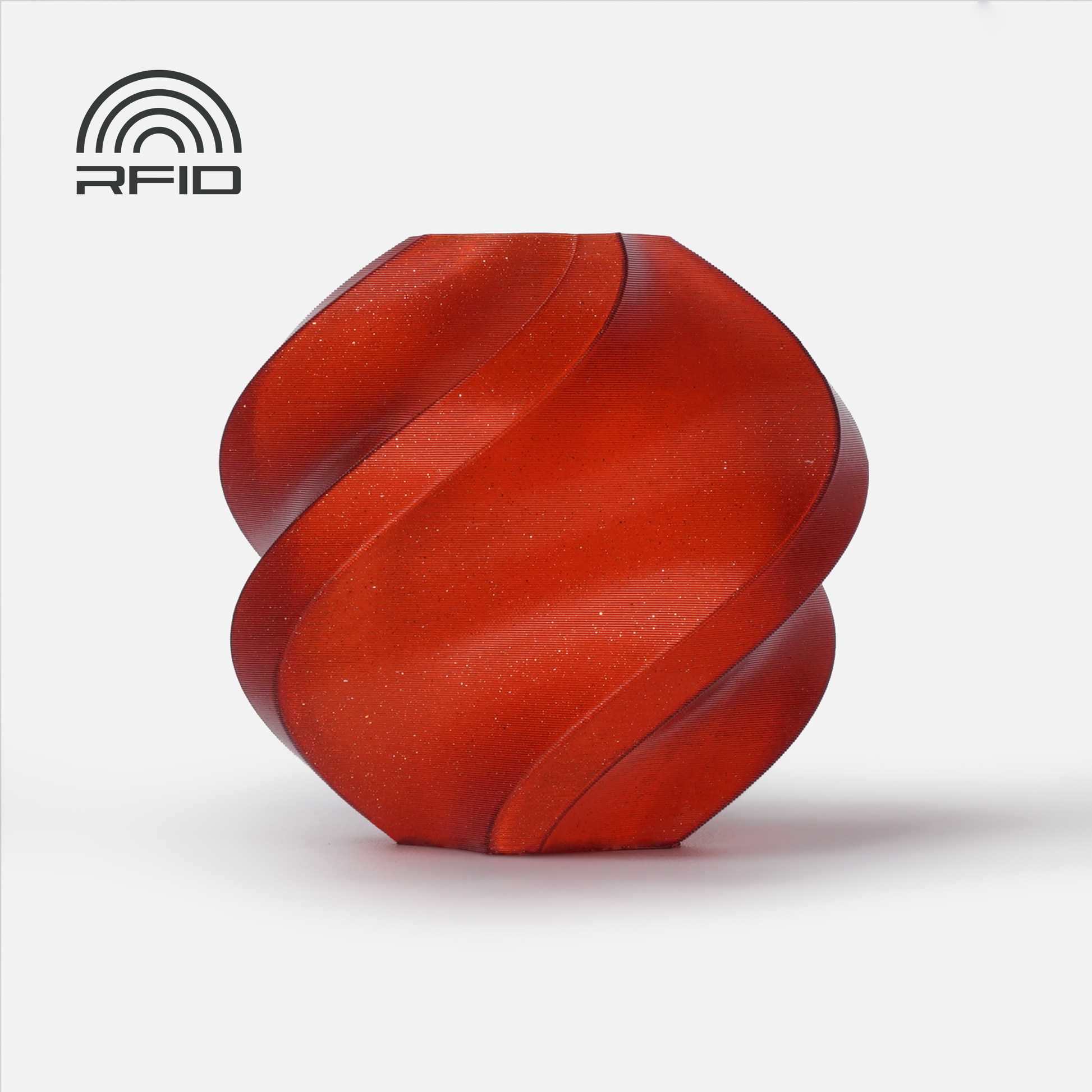 A red, faceted vase with a spiral design, 3D-printed using Bambu Lab Filament - PLA Sparkle by 3D Printing Perth - Cirrus Link, is shown on a white background with an RFID icon in the top left corner.