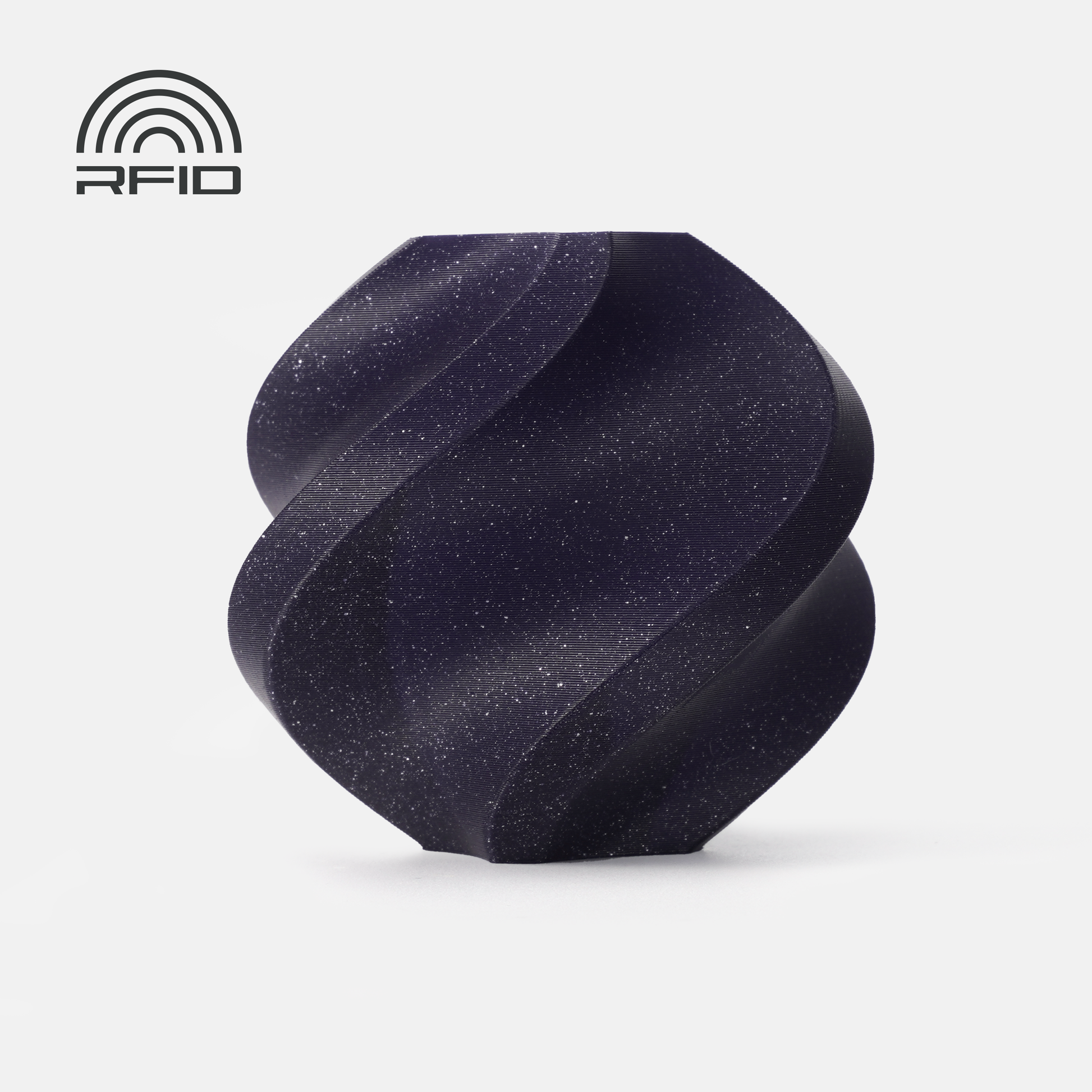 Bambu Lab Filament - PLA Sparkle by 3D Printing Perth - Cirrus Link, a dark spiral-shaped filament with a sparkling, speckled texture, sits on a white background. The RFID symbol is displayed in the upper left corner.