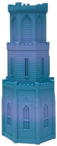 A blue plastic toy castle made from Toyar PLA Matte Rainbow 1.75mm Filament has three stacked sections, complete with arched windows and crenelated battlements.