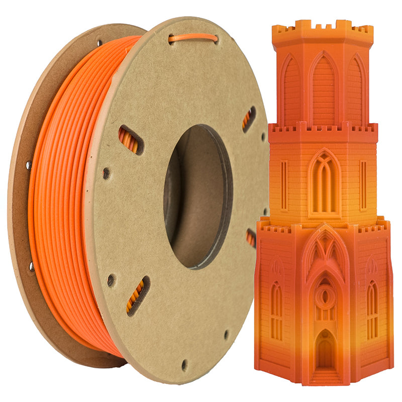 A spool of Toyar PLA Matte Rainbow 1.75mm Filament is displayed beside an orange and yellow Gothic-style 3D-printed tower, both showcasing the brand's smooth matte finish.