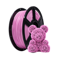 A spool of Flashforge PLA 1.75mm Basic Colour 3D Printing Filament in pink sits beside a geometric rose-pattern bear figurine, both displayed on a white background.