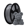 A spool of Flashforge PLA 1.75mm Basic Colour 3D Printing Filament in gray is displayed beside a small 3D-printed bear with a spiral geometric pattern.