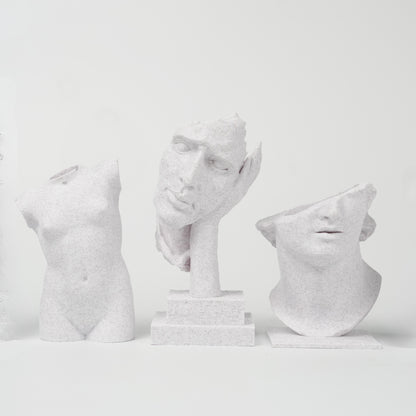 Three sculptures 3D printed with Flashforge HS PLA 1.75mm Filament in Marble Colour stand against a plain white background, each featuring a smooth surface finish that highlights the quality of Flashforge’s material.