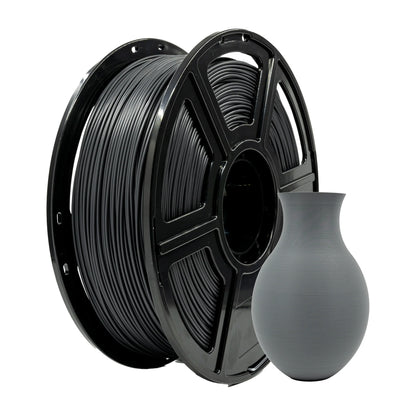 A spool of Flashforge PLA 1.75mm Matte Colour filament from 3D Printing Perth - Cirrus Link sits next to a small gray 3D-printed vase.