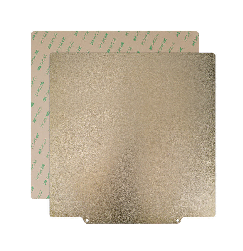 Two Double Side Coated PEI Hot Bed Platforms with Magnetic Base from Cirrus Link, one featuring a textured gold surface and the other highlighting high-temperature resistance with an adhesive backing, are displayed overlapping each other.