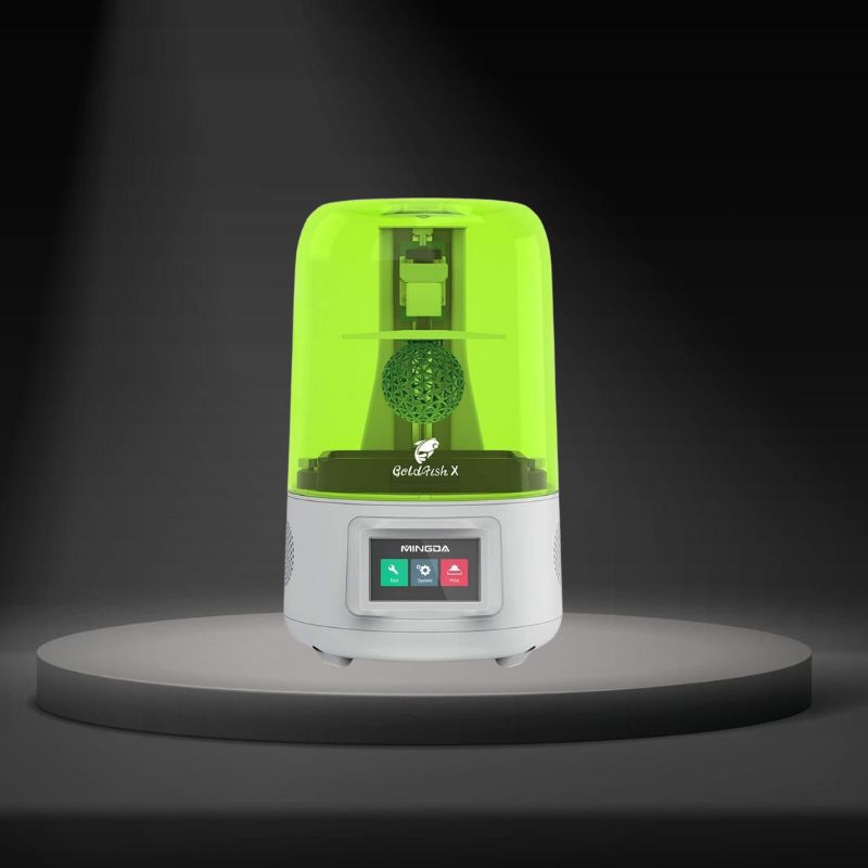 A green and white Black Friday 3D Printer MINGDA Goldfish X 2K Resin Printer humidifier on a table.