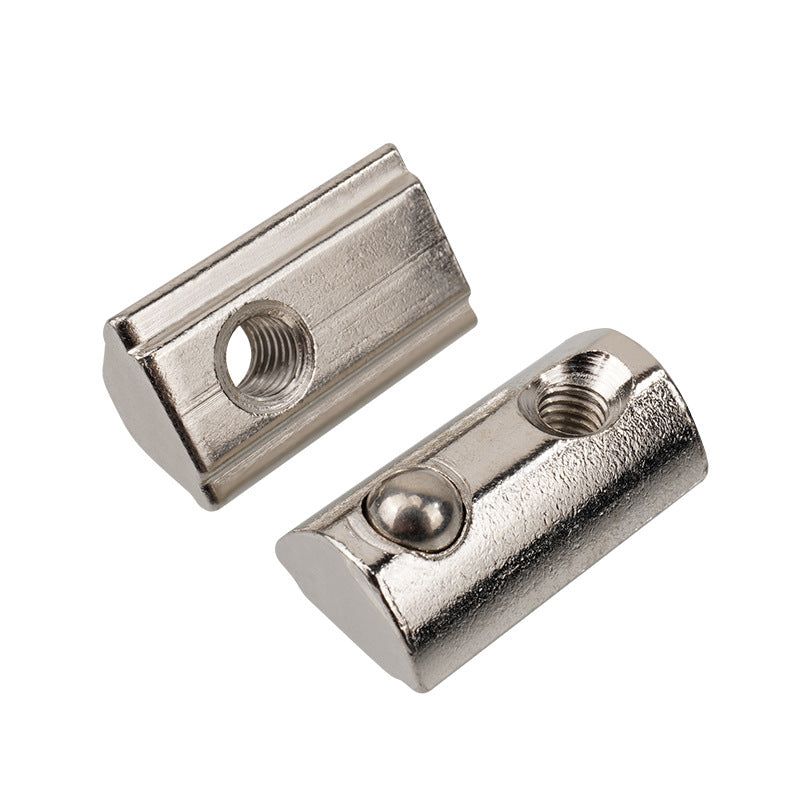 Two Aluminium Profile Elastic Ball Nuts Type 20 (14X8X4.2mm) from 3D Printing Perth - Cirrus Link, featuring threaded holes and grooves, essential for mechanical engineering projects, are displayed on a white background.