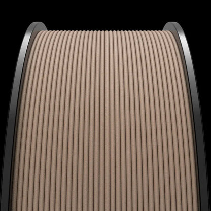 Close-up image of a spool of tightly coiled brown rope or cable, with a black background reminiscent of 3D printed objects using Filament - MakerHero WOOD Blend™ PLA+, which contains natural virgin wood powder.