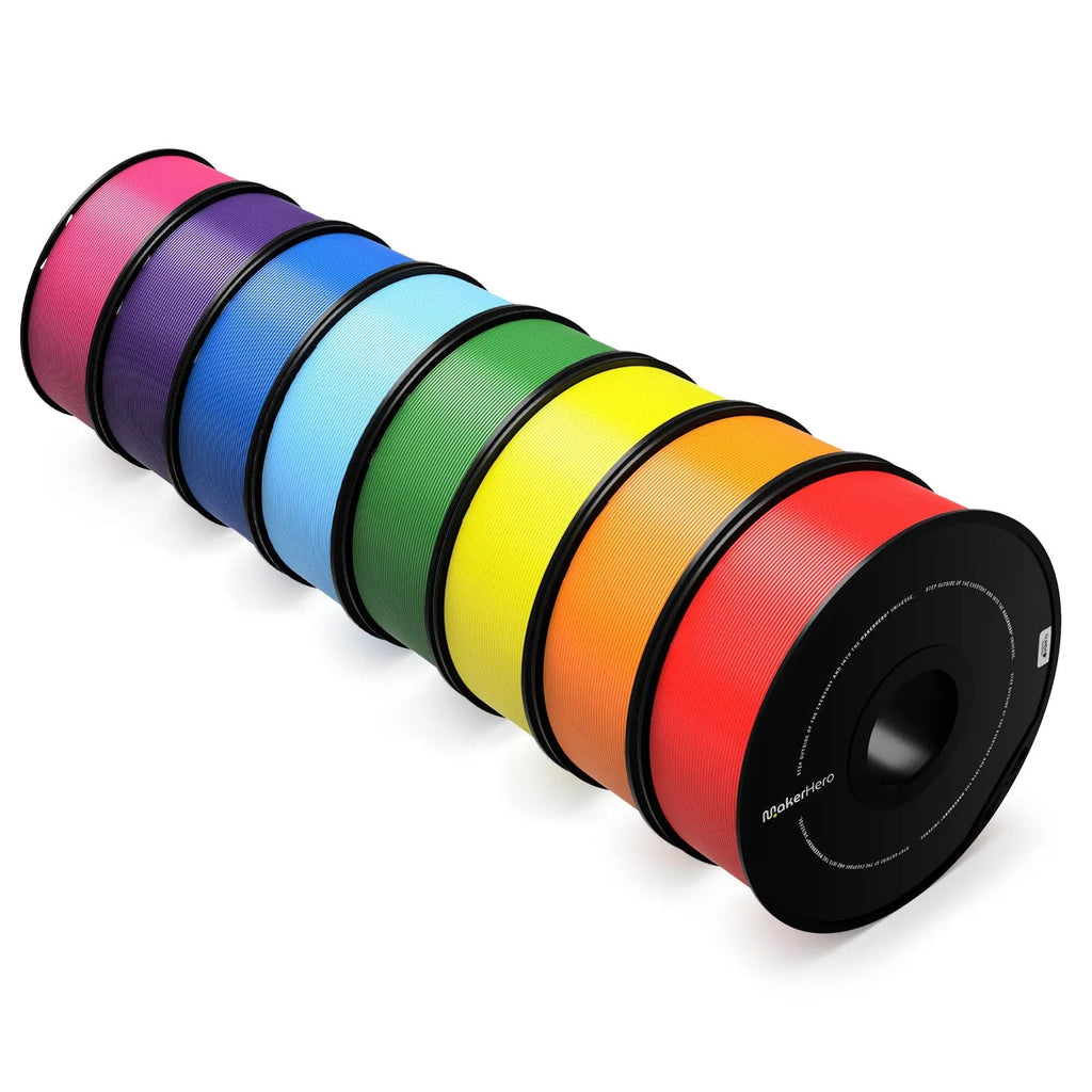 A stack of colorful, circular resistance bands ranging from pink to black, made from MakerHero PLA+ 1.75mm 3D Printing Filament, displayed isolated on a white background.