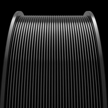 MakerHero PETG 1.75mm 3D Printing Filament coil in shades of gray with a reflective surface, tightly positioned vertical lines, viewed under a soft light against a dark background, used for functional prototypes.