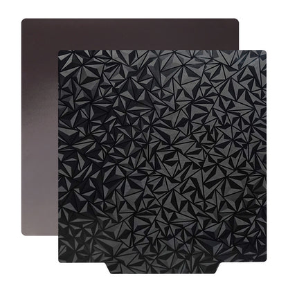 Two square plates: one features a smooth brown surface similar to the PEI side of the 3D Printer Build Surface, while the other displays a detailed black geometric pattern that highlights excellent adhesion and 3D printing surface capabilities, all under the brand of 3D Printing Perth - Cirrus Link.