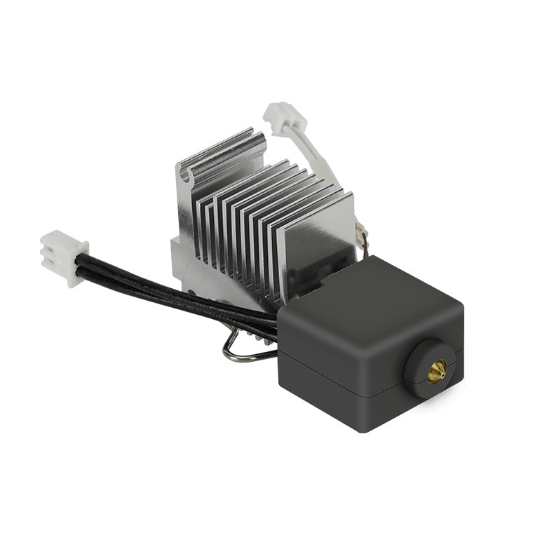 A metallic heat sink with cooling fins is attached to a black electronic component, similar to the precision of the Anycubic Kobra 3 Hardened Die Steel 04mm Nozzle from 3D Printing Perth - Cirrus Link. Two black cables with white connectors are visible, like those used in high-performance 3D printing setups.
