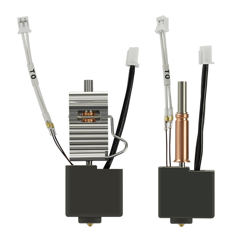 Two metal extruder components for a 3D printer by 3D Printing Perth - Cirrus Link, designed for Anycubic Kobra 3, include silver and copper parts with wires and connectors. Enhance your precision using the Anycubic Kobra 3 Brass 0.4mm Nozzle with Heat Sink.