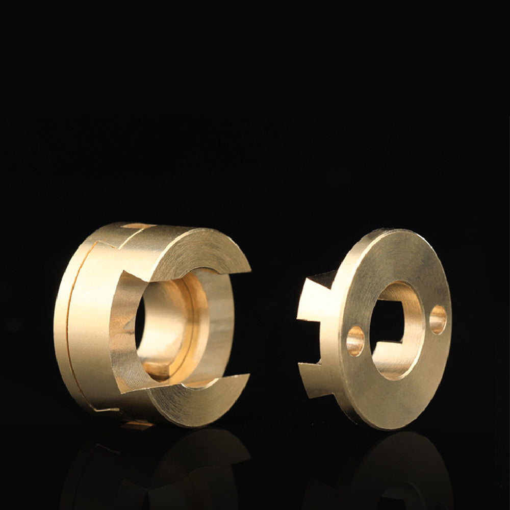 Two brass mechanical parts—a split and a notched solid—are shown on black, designed as Oldham Coupler and T8 Z-Axis Screw Upgrade for Ender 3 BLV Correction by 3D Printing Perth - Cirrus Link.