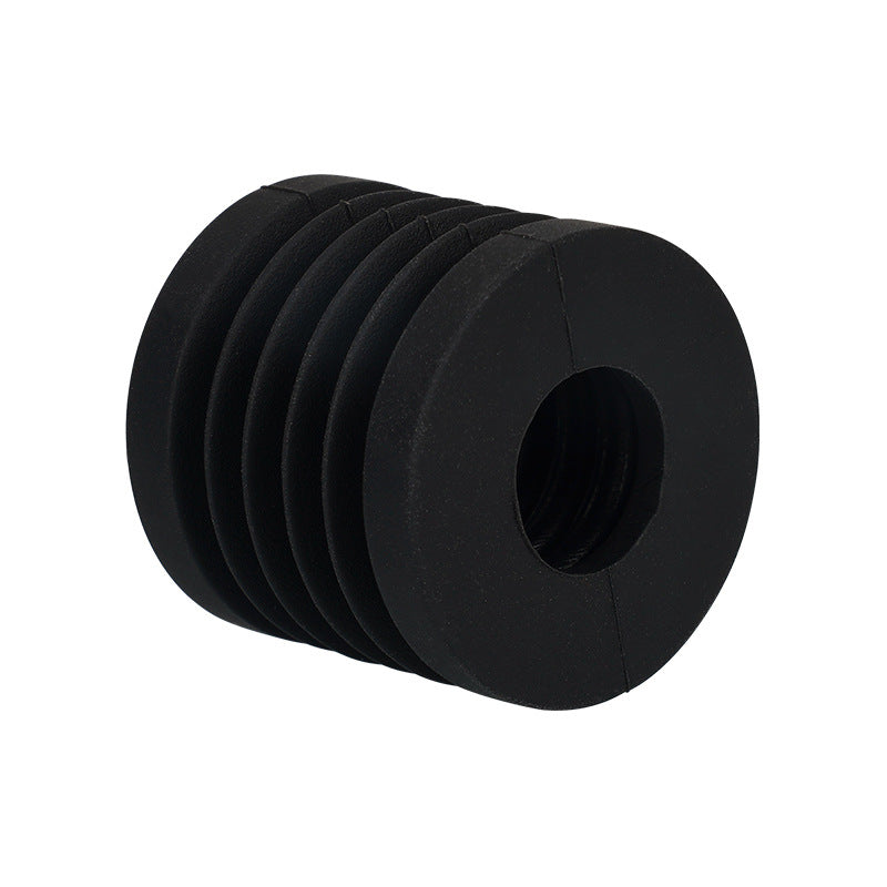 The black rubber vibration isolator with grooved segments and a central hole is perfect for the Bambu Lab X1C P1P Extruder V2.0 by 3D Printing Perth - Cirrus Link, enhancing stability for precision tasks like 3D printing with its shock-absorbing foot pad.