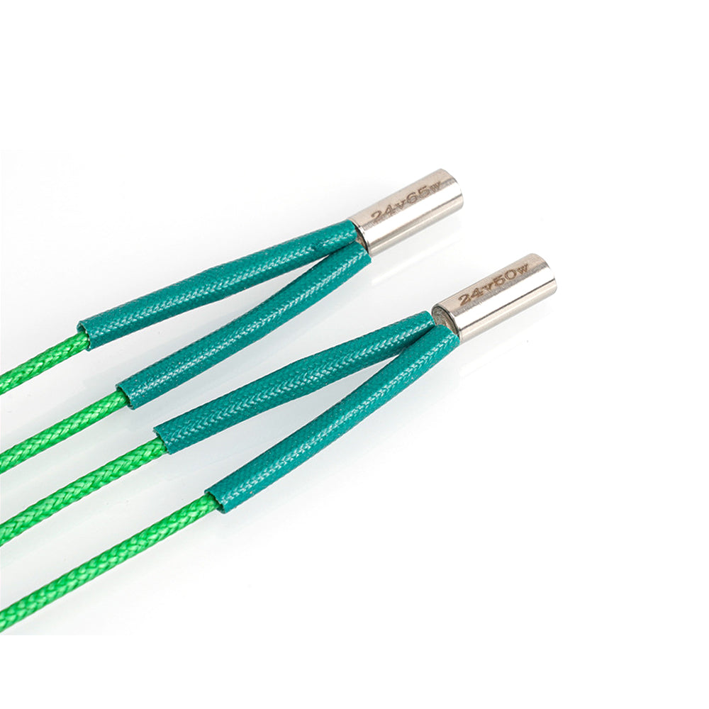 Two green braided cables with metallic connectors, labeled "24k 6.5Ω," are displayed—perfect as a Voron Green 24V 65W/50W 15cm Heating Rod from 3D Printing Perth - Cirrus Link for your 3D printer setup.
