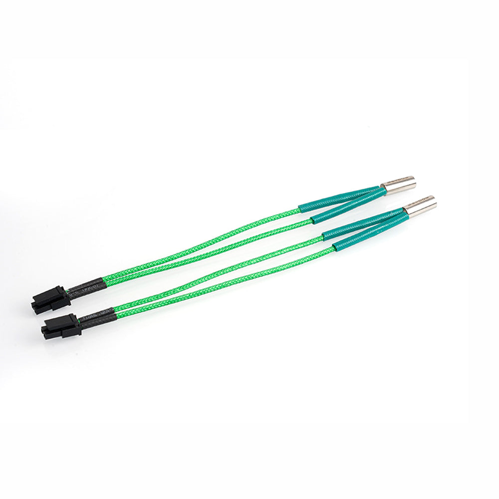 Two Voron Green 24V 50W/65W 15cm heating rods by 3D Printing Perth - Cirrus Link are laid parallel, featuring insulated green bodies, metal tips, and black connectors on a white background.