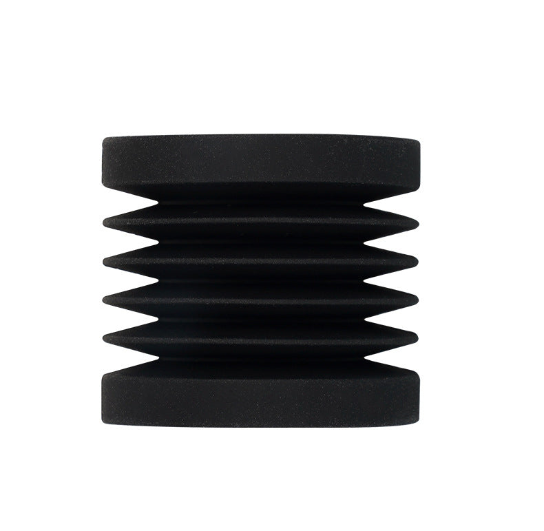 A black, cylindrical, ribbed rubber connector resembling an accordion sits on a plain white background. This 3D-printed piece represents precision and durability, capturing the innovative spirit of 3D Printing Perth - Cirrus Link's Bambu Lab X1C P1P Extruder V2.0 with Hardened Steel Hot End Upgrade and Fixing Bracket.