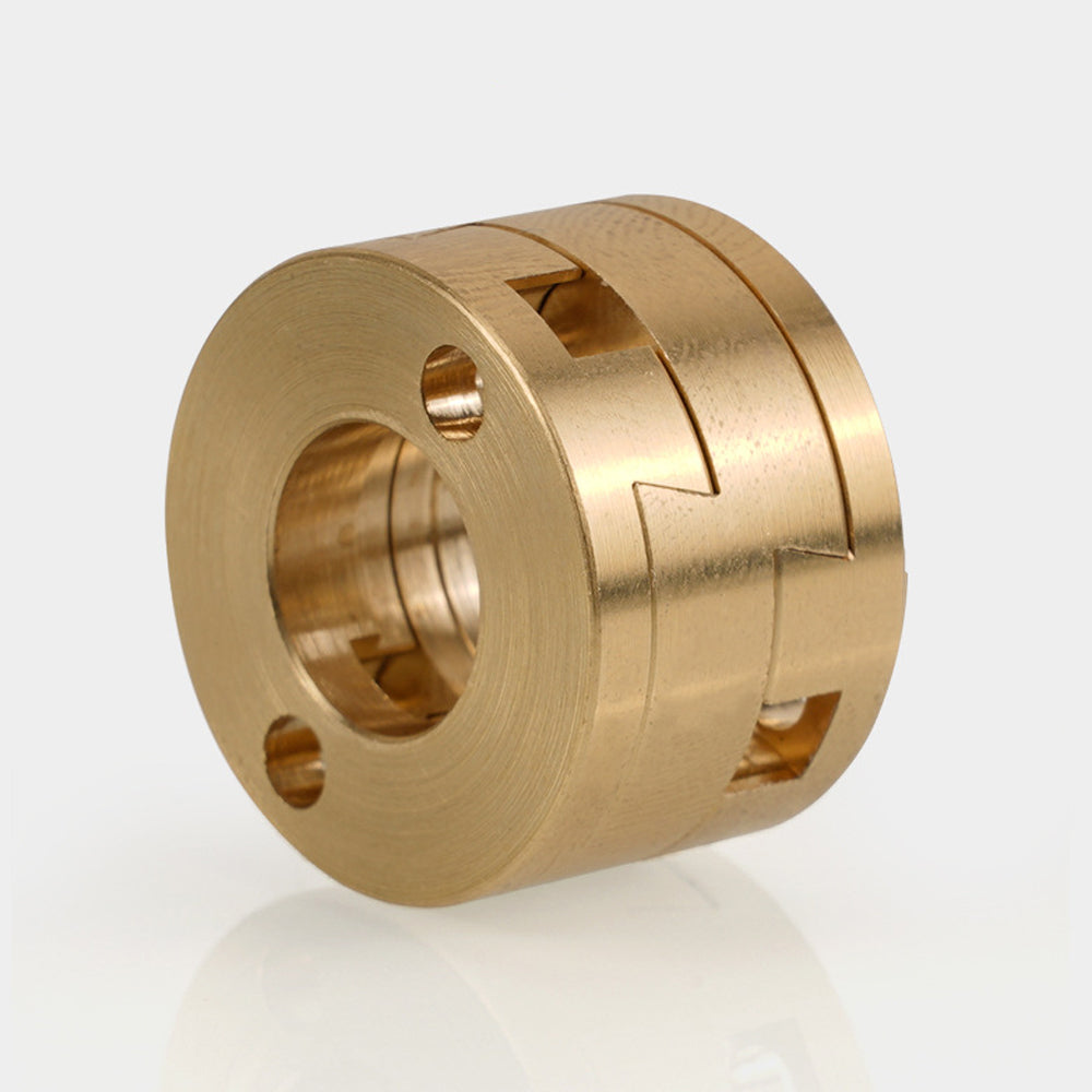 The Oldham Coupler and T8 Z-Axis Screw Upgrade for Ender 3 BLV Correction by 3D Printing Perth - Cirrus Link features a cylindrical brass design with three holes and zigzag notch—perfect for VzBoT builds and 3D printer upgrades.